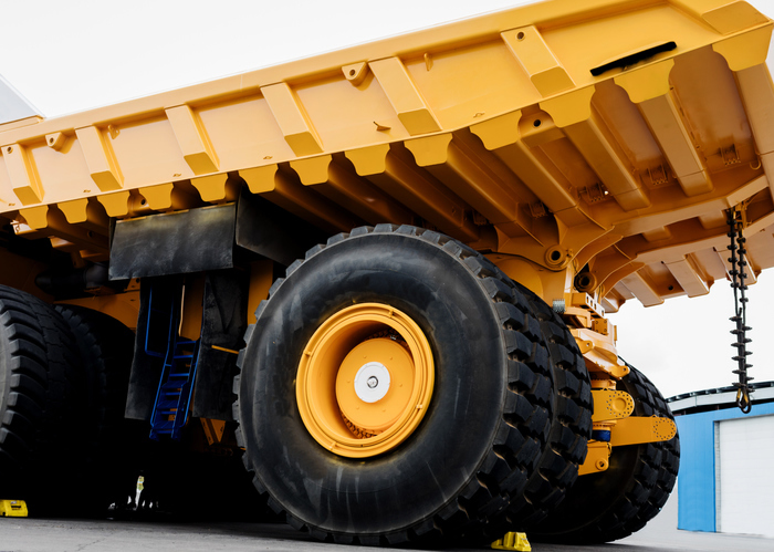 Big truck's wheels are about the size of a turbine that traps carbon dioxide.