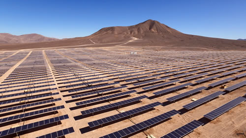 Desert emplacement of solar panels.